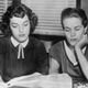 Carolyn Bryant and Juanita Milam (1927-2014), the wives of Roy Bryant and John William Milam, who stand accused of the kidnap and murder of Emmett Till, sitting in their husbands’ lawyer’s office across the street from the courthouse, reading newspaper accounts of the trial at Sumner courthouse in Sumner, Mississippi, September 1955. Black teenager Emmett Till was alleged to have whistled at Carolyn Bryant. (Photo by Bettmann Archive via Getty Images)